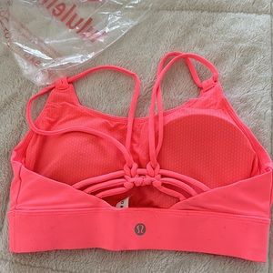 Gorgeous NEW workout bra. Beautiful coral color.